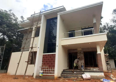 Nearing completion 
Shiju Philip and family 
2000 sqft
42 lkh
Pallikkal,  Kottarakkara  #modernhome  #WindowGlass  #ContemporaryHouse  #KeralaStyleHouse  #keralastyle  #jallybrick  #boxtypehouse