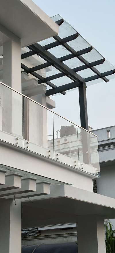 The "Modern & Minimal"
Where safety meets sophistication.

 ✨ Check out this seamless frameless toughened glass railing and custom glass pergola installation. Engineered for durability, designed for the view.
​#ToughenedGlass #ModernArchitecture #GlassFabrication #InteriorDesign #LuxuryLiving #Kannur