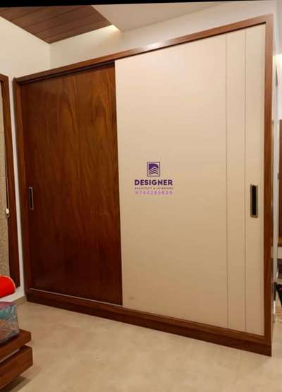 #sliding door wardrobe 
Designer interior 
9744285839