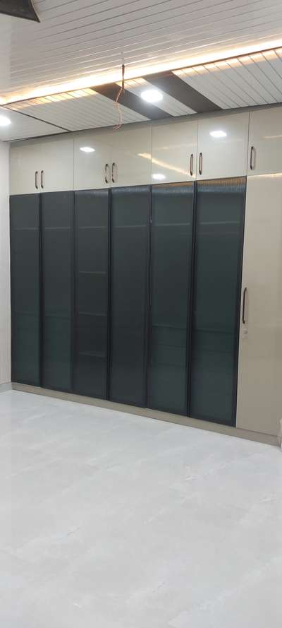 #modularwardrobe #woodenAlmirah #flutedglass