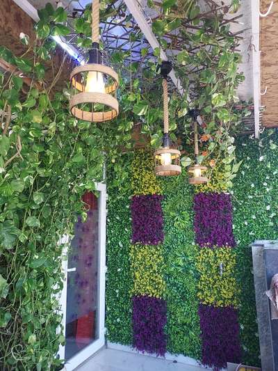 VERTICAL GARDEN WITH HANGING LIGHTS