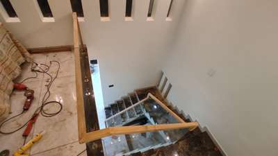 Ernakulam

#GlassBalconyRailing  #GlassHandRailStaircase  #StaircaseDecors  #StaircaseDesigns  #glasswork