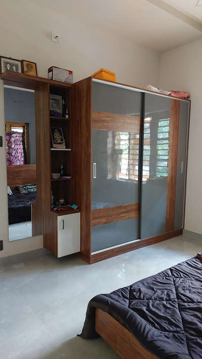 silding wardrobe+ mirror unit =₹.54,000