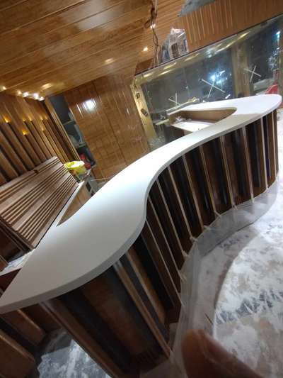 Reception Table of Corian  #InteriorDesigner#corian#