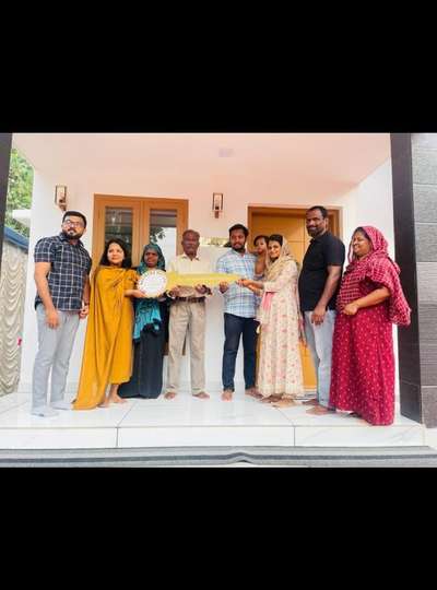 Key Handovering 😍🎉.... Ospicious moment of key handovering to our beloved client : Mr Ubais... Location : Alappuzha.
Total sq ft: 1126
 #BestBuildersInKerala  #besthome  #best_architect  #bestbuildersinkochi  #dreamhouse