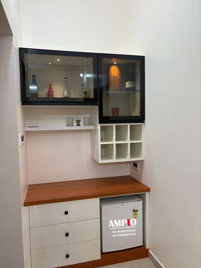 ✨ Cheers to Stylish Living! 🍷

Upgrade your home with this elegant mini bar setup that blends style and functionality perfectly 💫
✔️ Sleek glass display with lighting
✔️ Smart storage & wine slots
✔️ Compact fridge space
✔️ Premium wood & white finish

Create your own cozy corner to relax and entertain in style 🏡

🏡 At Ampio Home Decor, we create spaces that are thoughtful, stylish, and meaningful.

#MiniBar #HomeBarDesign #ModernHome #InteriorDesign #KeralaHomes #LuxuryInteriors #HomeDecor #Ampio