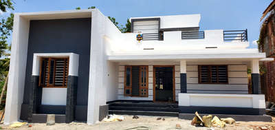 This modern home with a  perfect blend of aesthetics and natural beauty. Spanning 1600 sqft, it has 3 bedrooms, a hall, and a kitchen, providing ample space for comfortable living. Priced at 29 lakhs
 # plan
 #elevation 
 #contract work 
 #interior work 
 #vastu consultation 

for more details contact key planners constructions & designers