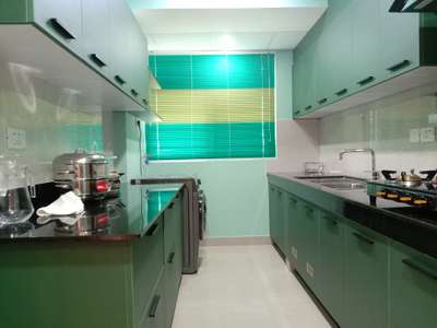 parallel kitchen 
completed at Kannur 
 #sreerosh  
 #freesia interiors