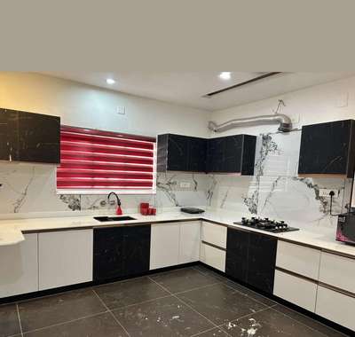 elegent and modern black marble & white glossy kitchen