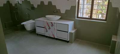 bathroom tile and basin and storage