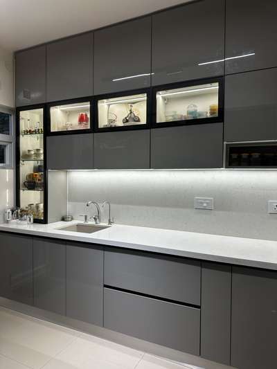 It’s a 13 year old kitchen which we removed completely and redid the whole kitchen with new counter top too. The best finishes and workmanship crafted with care and handed over in just 10 days  #KitchenIdeas  #ModularKitchen  #KitchenRenovation  #HouseRenovation  #acrylickitchen  #whitecountertop  #spectaquartz   #LShapeKitchen