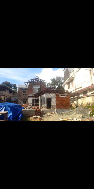 Residence construction in Progress at Vazhuthacaud, Trivandrum in 6 cents 😊, 4bhk plus mini workspace.

#tropicaldesign #traditional #compactdesign #trivandrumarchitects #exposedbrick #trussroof #traditionalroof #earthyfinishes