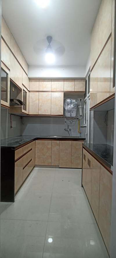 Modular kitchen by Rishi Home Interior