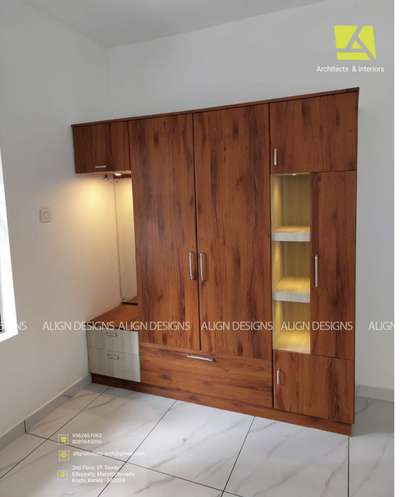 Completed Wardrobe at Vikasavany
ALIGN DESIGNS 
Architects & Interiors
2nd floor,VF Tower
Edapally,Marottichuvadu
Kochi, Kerala - 682024
Phone: 9562657062