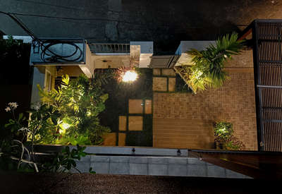 Residence - Mr. Christi Gomez at Trivandrum- Landscape #LandscapeIdeas #LandscapeGarden #Landscape #Landscape #landscapedesigns #lamp #landscapephotography
 #landscapingideas #pavingstones #skyview #nightwork #ContemporaryHouse #ContemporaryDesigns #ContemporaryHouse #contemporaryart #Architect #architecturedesigns #Architectural&Interior #architectureldesigns #PearlGrass #pebblestones #pebblestones #pebbles #HouseDesigns #HomeAutomation #homesweethome #HomeDecor #homedesignideas #homedecoration