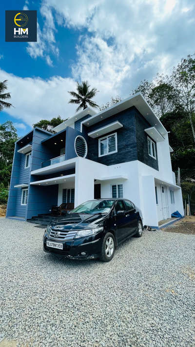 1888/4 bhk/Contemporary style
/double storey/Idukki

Project Name: 4 bhk,Contemporary style house 
Storey: double
Total Area: 1888
Bed Room: 4 bhk
Elevation Style: Contemporary
Location: Idukki
Completed Year: 

Cost: 35 lakh
Plot Size: