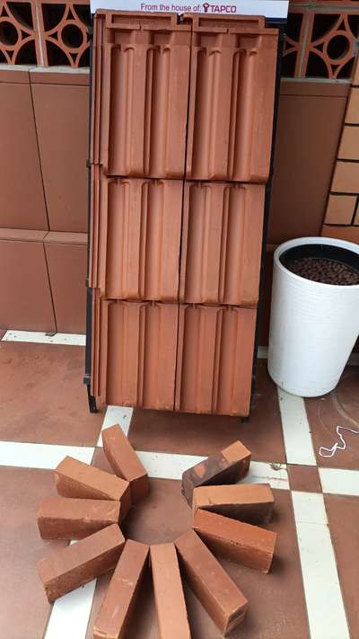Tapco double groove clay roofing tiles.