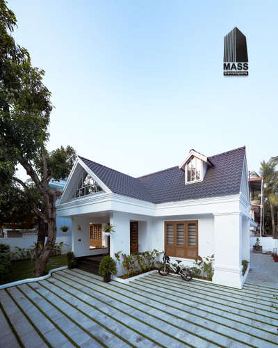 Mr. Joseph's house in Pachalam, Ernakulam, embodies the charm of colonial architecture, seamlessly blending timeless elegance with artistic sophistication, creating a luxurious and inviting living space. 

#ColonialCharm #SophisticatedSpaces 
#LuxuryLiving 
#creativedesign