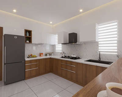 Modern modular kitchen with a clean, minimalist layout. 

Layout:
L-shaped kitchen with an efficient work triangle — refrigerator, stove, and sink are well-positioned for functionality.

  #modernkitchendesign #KitchenInterior