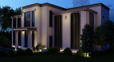The Neo-Classical Manor
Architectural Style: Neo-Classical Fusion

Key Features:

Symmetrical Elegance: A balanced facade featuring a prominent central entry and mirrored vertical elements that create a sense of grandeur and permanence.

Arched Fenestration: Tall, slender arched windows with dark mullions that draw the eye upward, blending traditional silhouettes with modern transparency.

Ornamental Cornice Work: Decorative crown molding and stepped parapets that add a layer of classical sophistication to the roofline.

Textural Contrast: A soft, sand-textured exterior finish paired with smooth stone-grey trims and moldings.

Formal Landscaping: Neatly manicured shrubs and a structured paved driveway with grass inserts (turf blocks) that complement the home's formal geometry.

Lighting Accents: Classic wall-mounted lanterns that provide a rhythmic glow across the facade, emphasizing the vertical pilasters
 #NeoClassical #ModernClassic #LuxuryVilla #ManorHouse #ClassicArchitecture