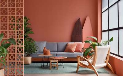 Create a warm and energetic atmosphere in your living room with this coral-terracotta colour pallette. Add grey sofa along the coral painted walls and matching rust colour cushions. Use wooden coffee table, stool and jute planters to get a natural look.
#interior #decor #ideas #home #interiordesign #indian #colourful #decorshopping