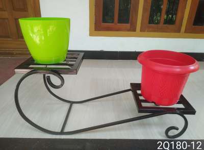 METAL STAND FOR INDOOR PLANTS. 

Durable, Eco friendly. Rest free, Not harmful for any floor, Adjustable legs for leveling.