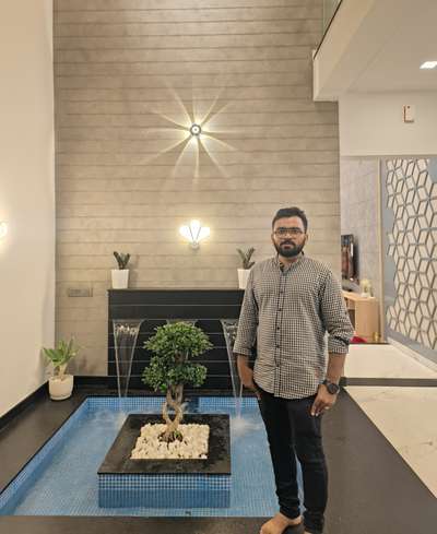 Water garden inside house
 #completed_house_construction #LUXURY_INTERIOR #InteriorDesigner #moderninteriors #moderndesign #waterfall #Architect