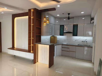 Apartment work !
@divyinteriors 

 #ClosedKitchen  #LargeKitchen  #WardrobeIdeas  #BedroomDesigns  #LivingroomDesigns  #Architectural&Interior  #WoodenKitchen  #Cabinet  #breakfastcounter #ceillingdesign