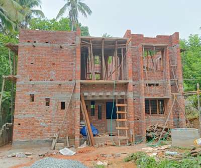 CASTLE BUILDERS AND ARCHITECTS
Our Site at Venganoor
Work in Progress

Thiruvananthapuram
Area 1553 SQFT
4BHK
Includes Front Door Teak and rest all Anjli or mohogony Doors and windows, Modular kitchen Factory setting, Pergola with glass, Balcony glass railings, High quality sanitary wares etc
 #ContemporaryHouse #Thiruvananthapuram #BestBuildersInKerala  #KeralaStyleHouse  #redbrickhouse #ModularKitchen #frontElevation