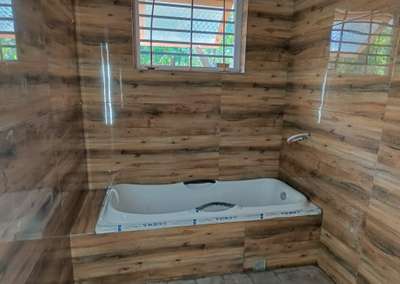 #BathroomTIles #BathroomDesigns #BathroomFittings #bathtub  #woodentile #BathroomIdeas #bathroomdesign
#InteriorDesigner 
#interiordesignkerala