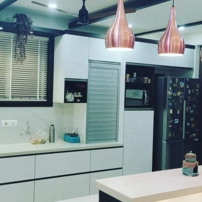 milky white acrylic premium kitchen  #KitchenIdeas  #LShapeKitchen  #ModularKitchen  #InteriorDesigner  #BedroomDecor  #Barcounter