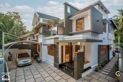 Modern Contemprary Design of  Architecture in 2341 sq.ft!
2341sq.ft|Contemporary style| double storey|Full home| Calicut

Design and Execution: corbel_architecture
Credits: fayis_corbel