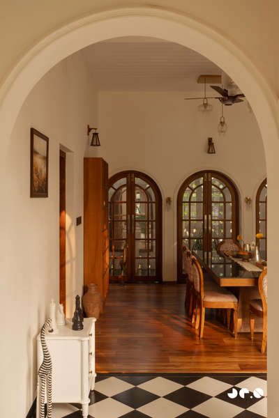 Arcade – Where arches, light, and landscape converse, and tradition finds a quiet 
contemporary soul.
Clients : @aarcha_vinod @ramvinodk 
Area: 4488 Sq.ft
Location: Bharanikavu, Kollam, Kerala.
Principal Architect/Designers: @ar.jun_v_a @_ar_anoop @ananthansurendran 
Interior Styling: Adheena Baburaj @dhii_design_studio 
Photography: @iksha.in #architecturedesigns  #KeralaStyleHouse  #TraditionalHouse  #interiordesignerkerala  #Architectural&Interior   #architectsinkerala