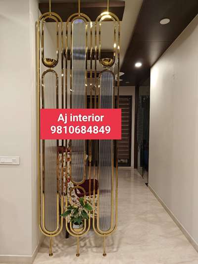 Oval shape partition work done in stainless steel with PVD coating exclusive design customized available for requirement