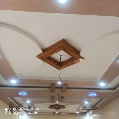 gypsum ceiling and wooden work  
9993209811