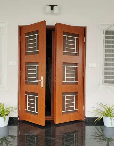 Pravesh doors have a premium grain finish achieved through advanced sublimation technology. Unlike wooden doors, they are less susceptible to damage, peel, crack, warping and bowing. The door leaves are made of Galvanised iron sheet with  Honeycomb filling for strength and to sound exactly like wood. They are coated with zinc phosphate to prevent rusting.

Tata Pravesh doors come with a frame and a whole set of accessories such as lock, key holes, peephole, lock set, tower bolt, stopper, hinges etc. thus offering you “Your Value for Money”. With 5-Year warranty on locks, manufacturing defects, colour and texture fading.Tata Pravesh doors are a complete solution for your dream home with free delivery and installation by the company-trained team.

Being environmentally friendly, every 2 Tata Pravesh doors save a tree. So, let’s begin this journey towards a green future!

Sree Ventures
Thrissur - 9447870900
BEST PRIVILEGE DEALER IN OVER ALL PERFORMANCE IN SOUTH INDIA 2022 
runner up
