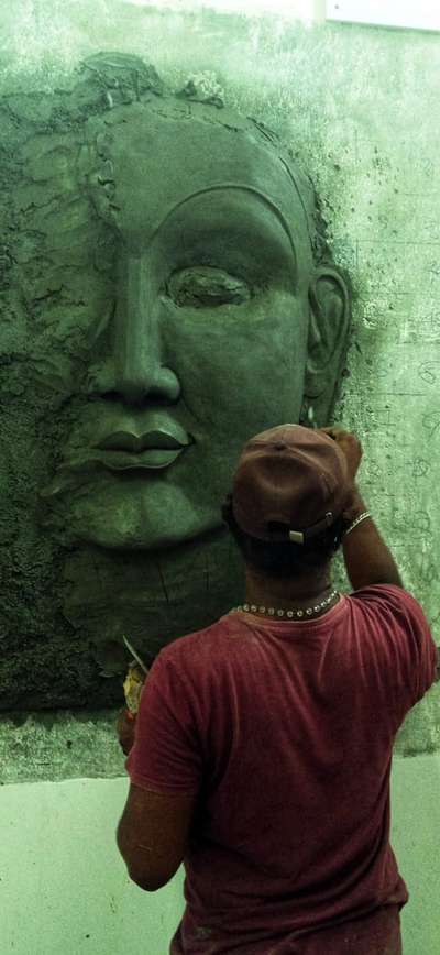 Budha.
cement art on wall