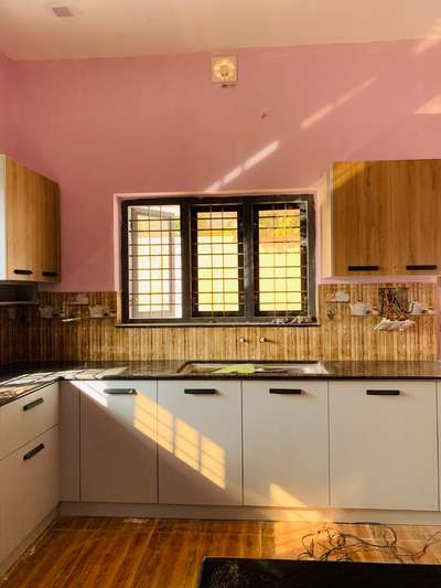 #KitchenCabinet  #LShapeKitchen  #modularkitchenkerala  #KitchenInterior ..
low cost kitchen from wonderwall design studio. starts from 2 lakhs onwards.