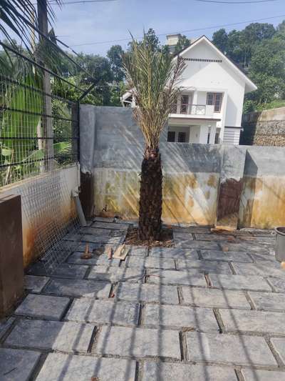 filim. actress pathoosinte. landscape. and garden. design. work. progress