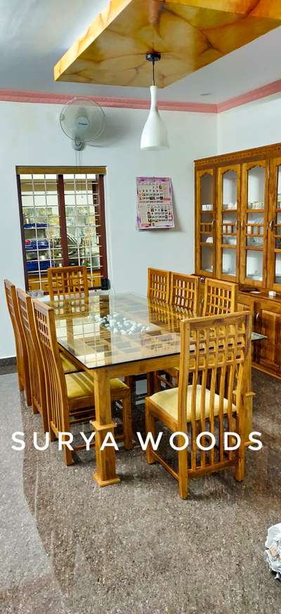 8*4 table with 8 chair. 
Teak wood quality