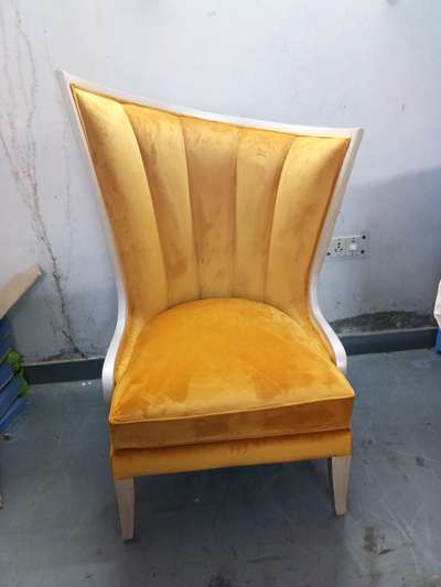 wings chair of mustard velvet fabric