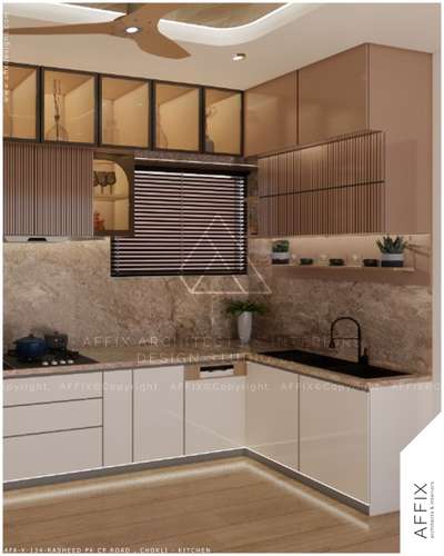 This luxurious L-shaped kitchen features high-gloss light beige lower cabinets, an eye-catching veined marble backsplash, mixed upper cabinetry including slatted tambour units and framed glass displays, a matte black sink and faucet, and a wooden shaded ceiling fan set into a subtly curved ceiling detail. #Architect  #architecturedesigns  #Architectural&Interior  #architecturekerala  #kerala_architecture  #best_architect  #ModularKitchen
