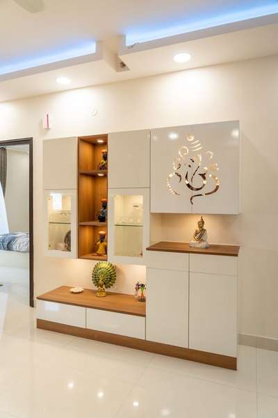 Pooja and crockery unit by weatinterior interior design studio