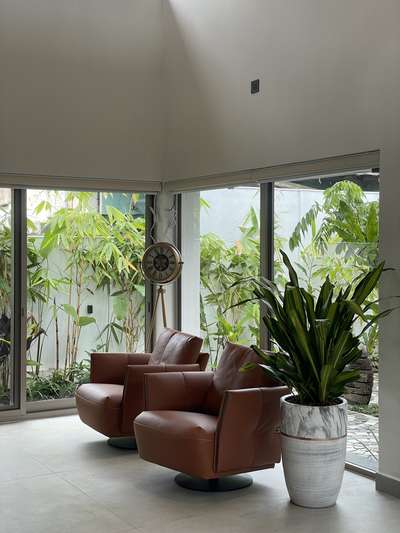 Living room

#InteriorDesignKerala #HomeDecorKerala #IndianInteriors #VastuDesign #SustainableInteriors #BiophilicDesign #CustomFurniture #ArchitecturalDesign #interiorideas