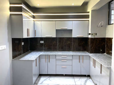 Hear is the project of kitchen completed by our team. 
we have use profile lights for ambiance and the theme color is grey as per client demand . 
 #KitchenIdeas  #LargeKitchen  #LShapeKitchen  #KitchenCabinet  #WoodenKitchen  #ClosedKitchen  #KitchenRenovation  #Architectural&Interior  #intetrior  #KitchenRenovation
