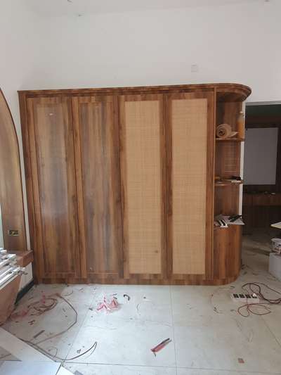 wardrobe (multiwood,mica,canes)
 #Architectural&Interior  #interiordesignkerala  #4DoorWardrobe  #CustomizedWardrobe #MasterBedroom #bestdecor #HomeDecor