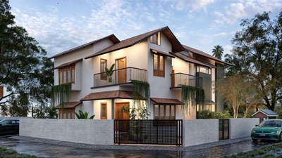 A modern interpretation of a traditional Kerala-style house, with a pitched roof, wooden accents, and a blend of contemporary and classic design elements. The exterior features a warm color palette and a well-maintained garden.