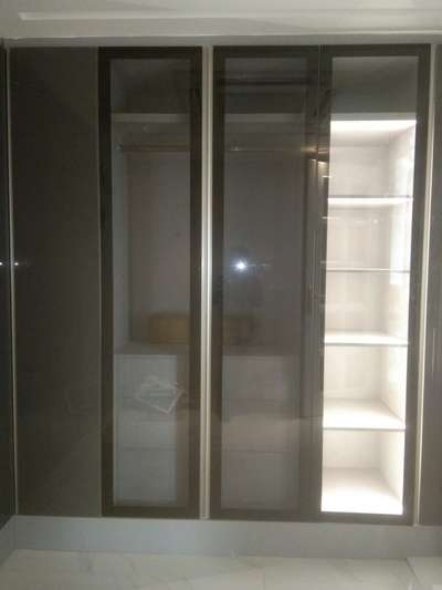 Glass wardrobe with led lighting 

#modularwardrobe #WardrobeIdeas #WardrobeDesigns #InteriorDesigner #bedroomwardrobe #glasswardrobe #CustomizedWardrobe