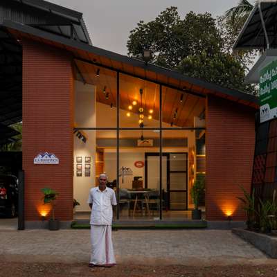 "S.A Roofings' renovated showroom at Mukhampadi, Pattikkad, was a challenging project. The structure comprised steel pipes and roofing sheets, necessitating a makeover within these constraints. The design concept embraced minimalism, retaining the old roofingsheet structure with the same slope. We utilized the showroom's products as facade, incorporated imported lengthy brick cladding, and employed terracotta ceiling tiles. Ambient and highlighting lights illuminated the space, while a showwall showcased S.A Roofings' 40-year history. White walls and concrete finish tiles accentuated the products, and notably, we maintained the same height as the old structure."
. 
. 
. 
. 
. 
. 
. 
#keralahomes #kerala #architecture #keralahomedesign #interiordesign #homedecor #home #homesweethome #interior #keralaarchitecture #interiordesigner #homedesign #keralahomeplanners #homedesignideas #homedecoration #keralainteriordesign  #architect #archdaily  #homestyling #traditional #keralahome #freekeral