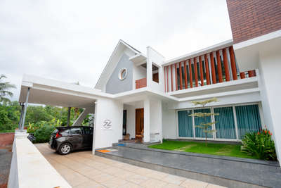 Completed Residence at Mayyil, Kannur
Client : Mr.Karunakaran
Total Area : 2050 sqft
Architects : @ar.ashrith & @ar_akshay_akp 
Photography : @arc.circle
#architect #architecturephotography  #architecture #housedesigning #tropicalhouse #tropicalhome #tropicalarchitecture #modernarchitecture  #modernarchitecturedesign #modernarchitecturephotography #architecturedesigns #HouseDesigns #tropicalhouse #tropicallandscape #tropicalgarden #tropicalmodernism  #50LakhHouse #semi_contemporary_home_design #ContemporaryDesigns #InteriorDesigner #LUXURY_INTERIOR #Architectural&Interior